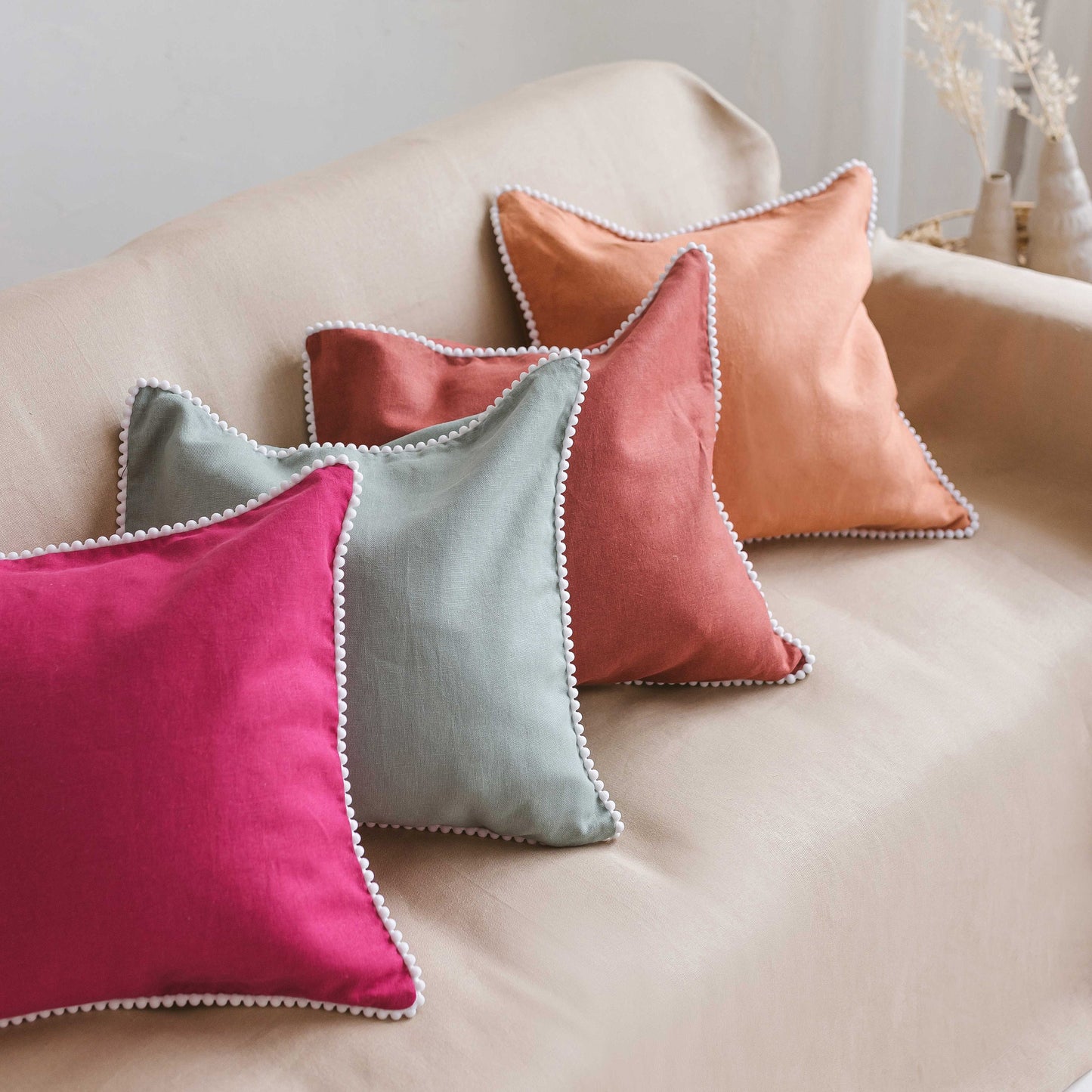 Decorative Linen Cushion with Pom Poms